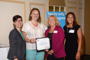 Stephanie, second from left, with Jean Dutch, Allen Insurance operations manager, second from right. 
