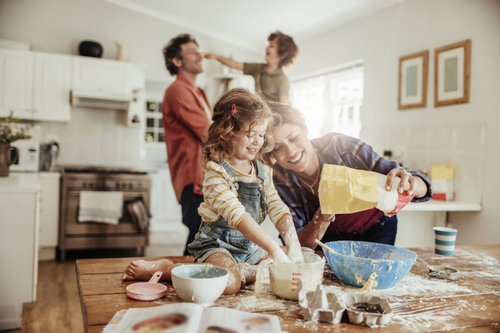 Family in the kitchen - personal insurance, Allen Insurance and Financial